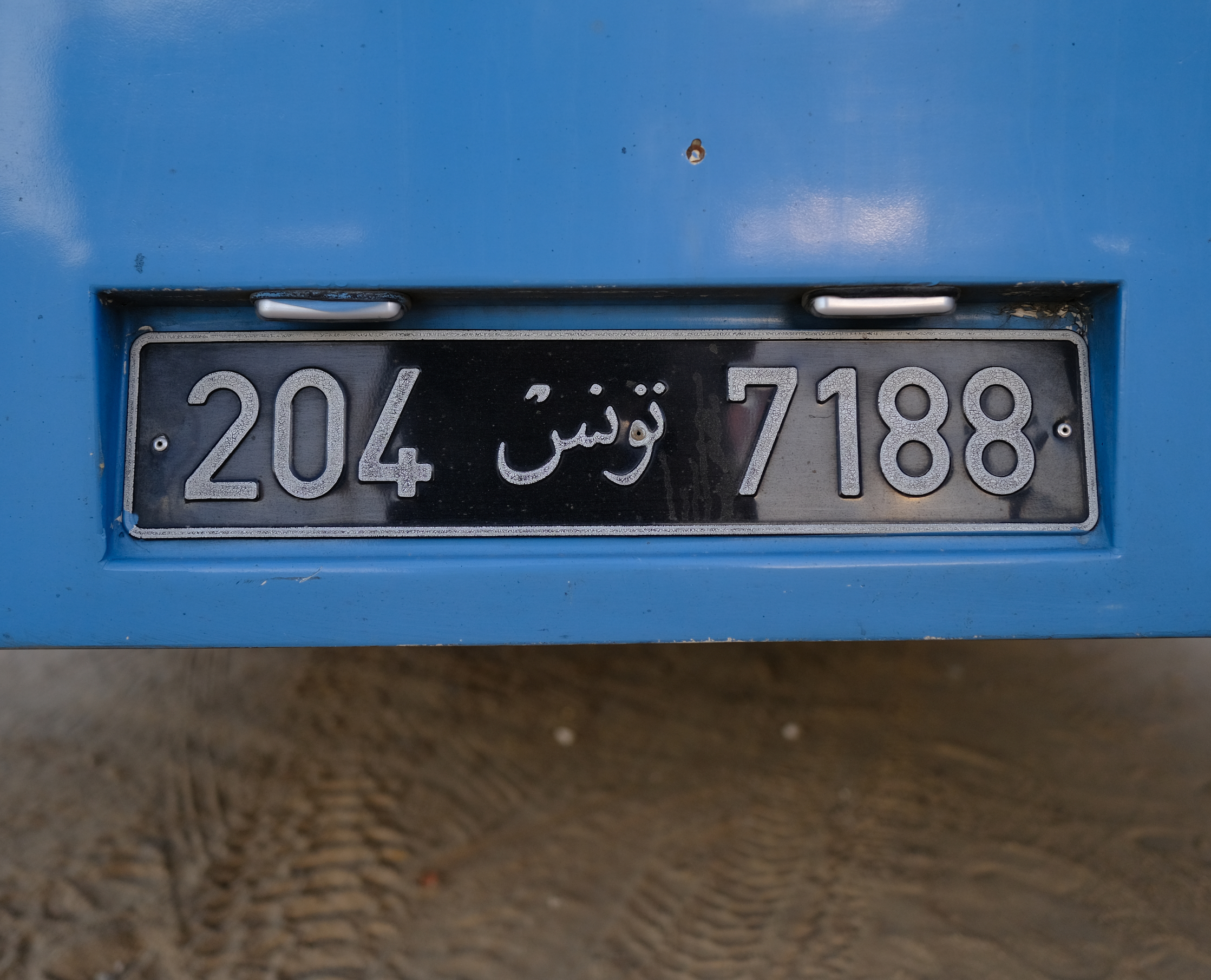DIN Typeface – Another example of its widespread use around the world can be seen here: a license plate in Tunisia.
